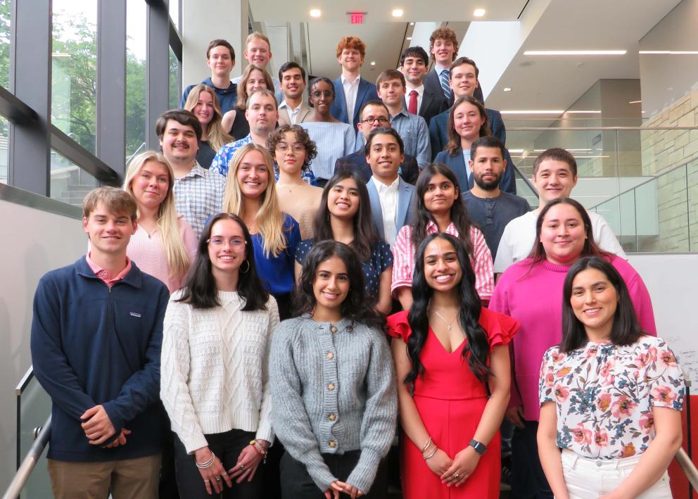 WISE undergrads and graduate students posing for a group photo on a staircase