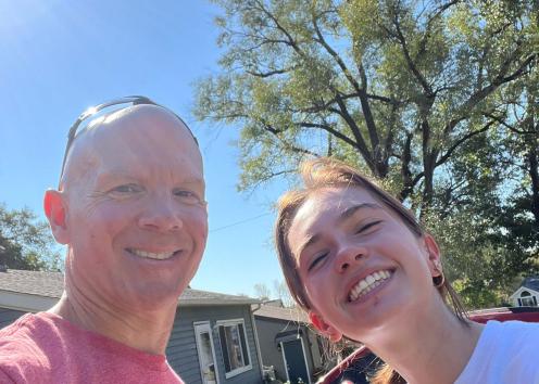Mark and a student smile for a selfie