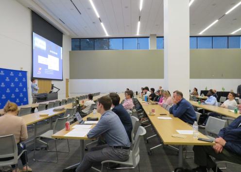 People in a clasroom watching a presentation